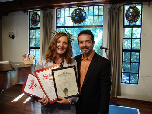 Maja Trochimczyk as Poet Laureate of Sunland-Tujunga with 
		Joe DeCenzo, April 2010